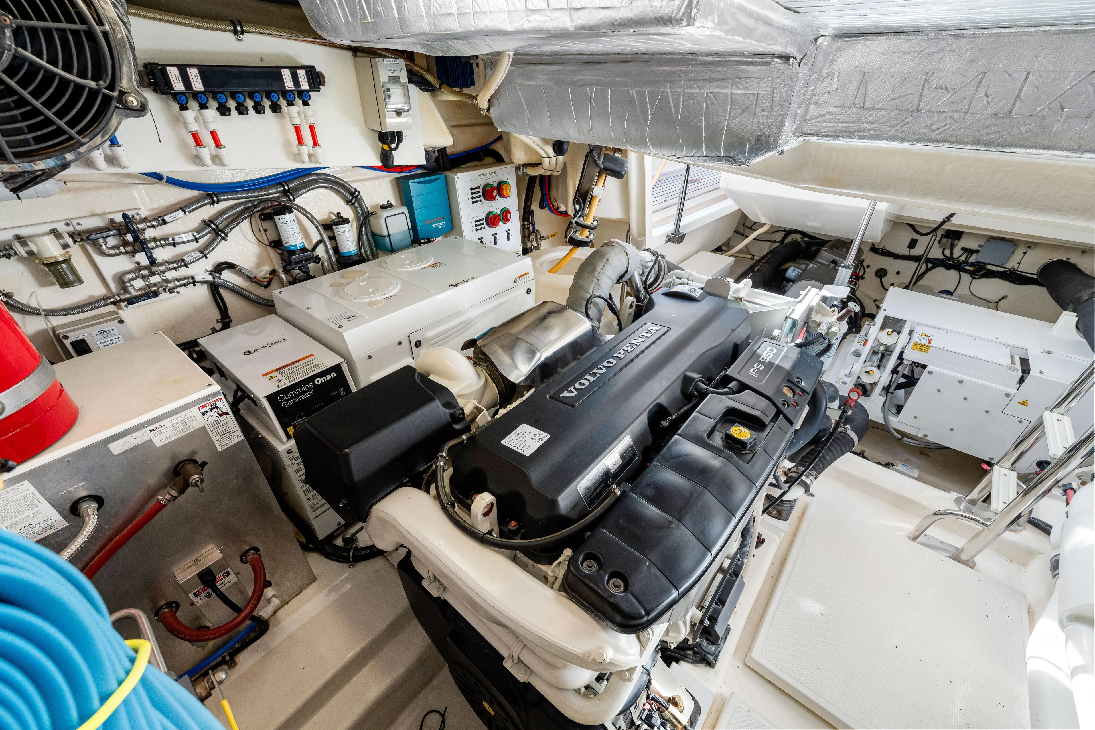 Escape Pod Yacht Photos Pics Engine room of 2015 Riviera 565 SUV with Volvo Penta engine and Cummins Onan generator.