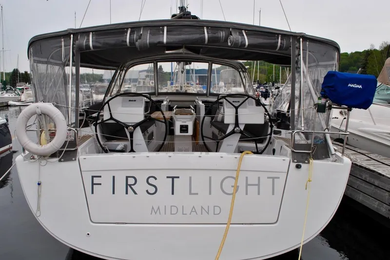 First Light Yacht Photos Pics 2017 Hanse 505 sailboat named "First Light" docked at a marina.