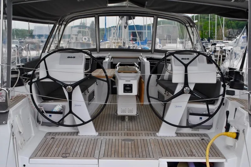 First Light Yacht Photos Pics 2017 Hanse 505 yacht cockpit with dual steering wheels and modern navigation equipment.