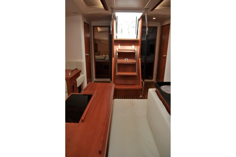 First Light Yacht Photos Pics Interior of 2017 Hanse 505 yacht with wooden finishes and modern design.