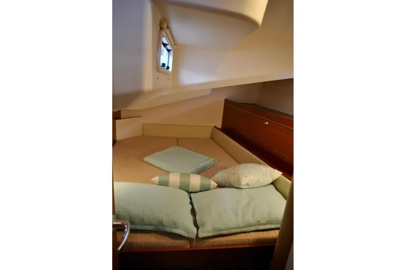 First Light Yacht Photos Pics Cozy cabin interior of 2017 Hanse 505 yacht with comfortable bedding.