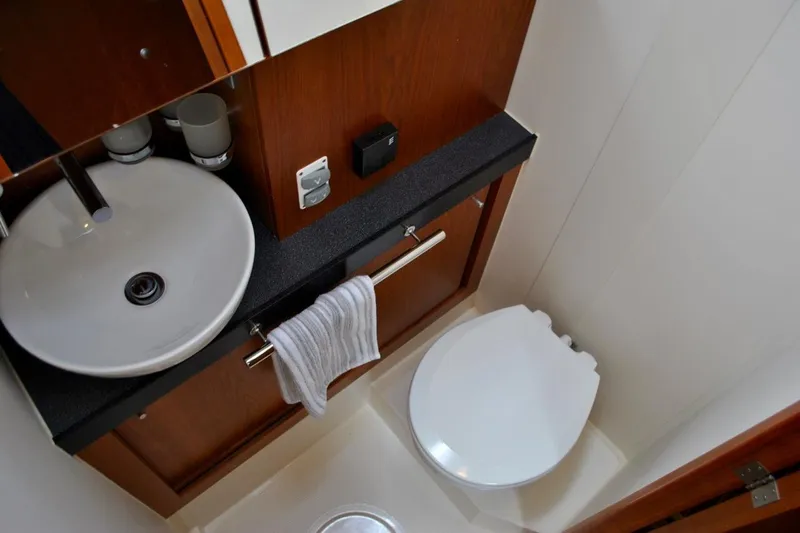 First Light Yacht Photos Pics Bathroom interior of 2017 Hanse 505 yacht with sink and toilet.