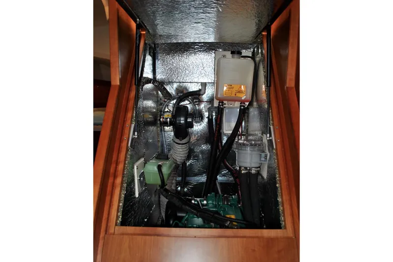 First Light Yacht Photos Pics Engine compartment of a 2017 Hanse 505 yacht, showcasing mechanical components and wiring.