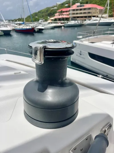 Sea Dog Yacht Photos Pics Sailboat winch on a 2023 Bali 4.6 yacht, docked in a marina.