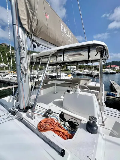 Sea Dog Yacht Photos Pics 2023 Bali 4.6 catamaran docked at marina, showcasing deck and rigging.