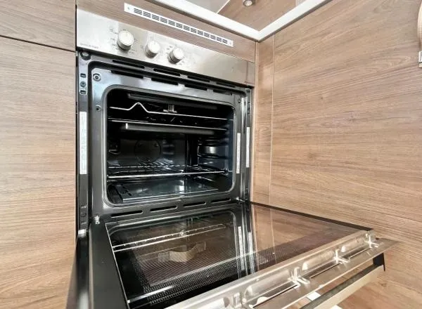 Sea Dog Yacht Photos Pics Modern Bali 4.6 oven, 2023 model, with open door in sleek kitchen setting.