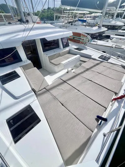 Sea Dog Yacht Photos Pics Modern 2023 Bali 4.6 yacht with spacious deck and comfortable seating area.