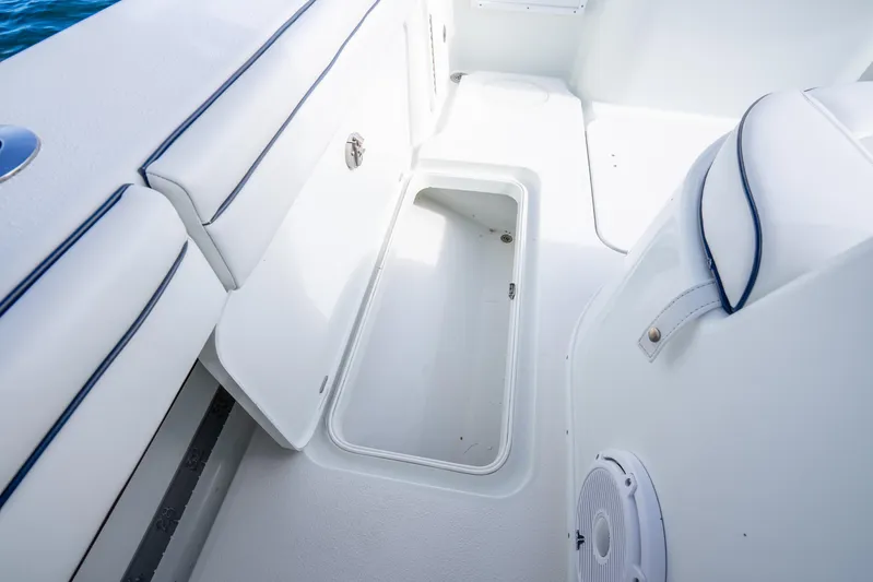  Yacht Photos Pics 2016 Yellowfin 36 Offshore boat interior storage compartment with open hatch.