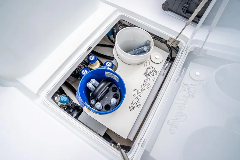  Yacht Photos Pics Storage compartment of 2016 Yellowfin 36 Offshore boat with fishing gear and supplies.