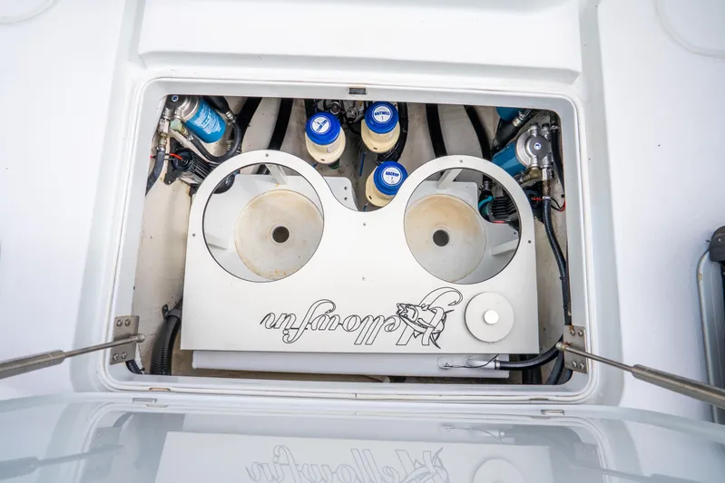  Yacht Photos Pics Engine compartment of 2016 Yellowfin 36 Offshore boat, showcasing mechanical components.