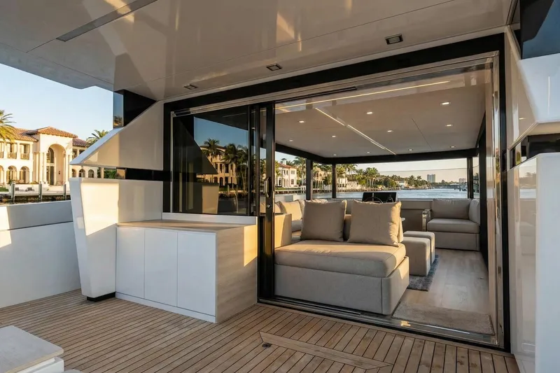  Yacht Photos Pics Luxurious 2026 Ladenstein L48 MIAMI yacht interior with modern seating and waterfront view.