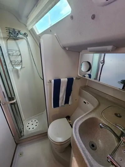 Soleyah Yacht Photos Pics 2007 Catalina 387 yacht bathroom with shower, sink, and toilet.