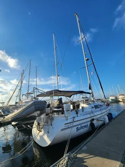 Soleyah Yacht Photos Pics Catalina 387 sailboat, 2007 model, docked at marina under clear blue sky.