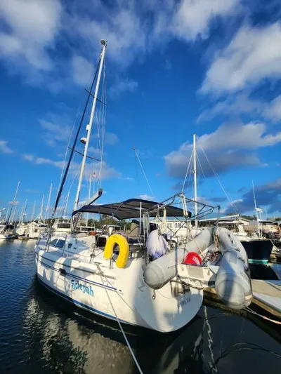 Soleyah Yacht Photos Pics 2007 Catalina 387 sailboat docked in marina under blue sky.