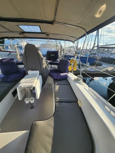 Soleyah Yacht Photos Pics 2007 Catalina 387 sailboat interior with seating, docked at marina.