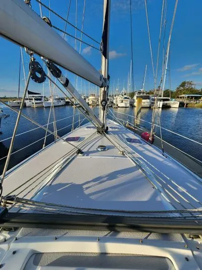 Soleyah Yacht Photos Pics 2007 Catalina 387 sailboat docked in a marina under clear blue skies.