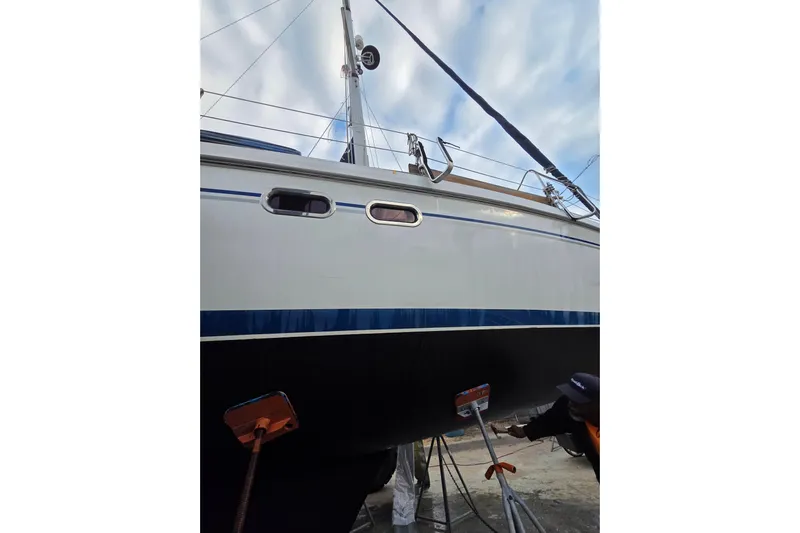 Soleyah Yacht Photos Pics 2007 Catalina 387 sailboat on dry dock, showcasing hull and rigging.