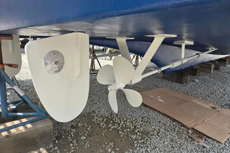 Windrush Yacht Photos Pics Underwater view of a 1966 Trumpy 55 boat's propeller and rudder.