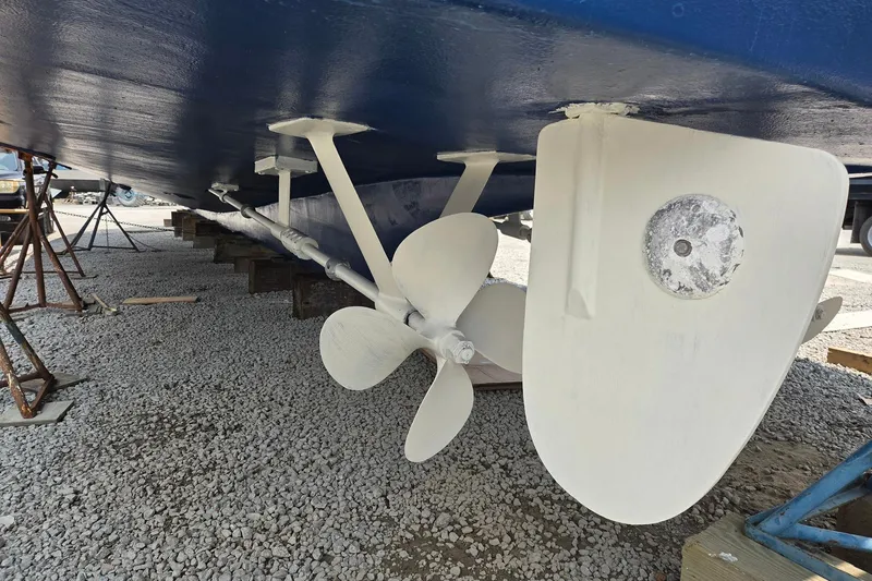 Windrush Yacht Photos Pics Underwater view of 1966 Trumpy 55 yacht's propeller and rudder on dry dock.