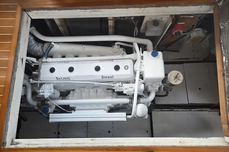 Windrush Yacht Photos Pics Engine compartment of a 1966 Trumpy 55, featuring a Detroit Diesel engine.