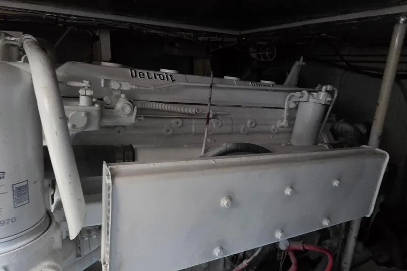 Windrush Yacht Photos Pics Engine room of a 1966 Trumpy 55 yacht featuring a Detroit Diesel engine.