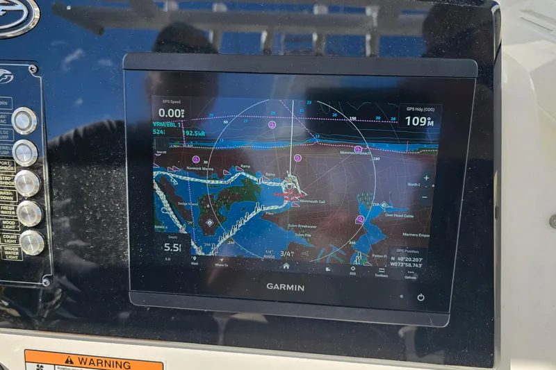  Yacht Photos Pics 2024 Sea Fox 268 Commander with Garmin navigation display showing nautical map and GPS data.