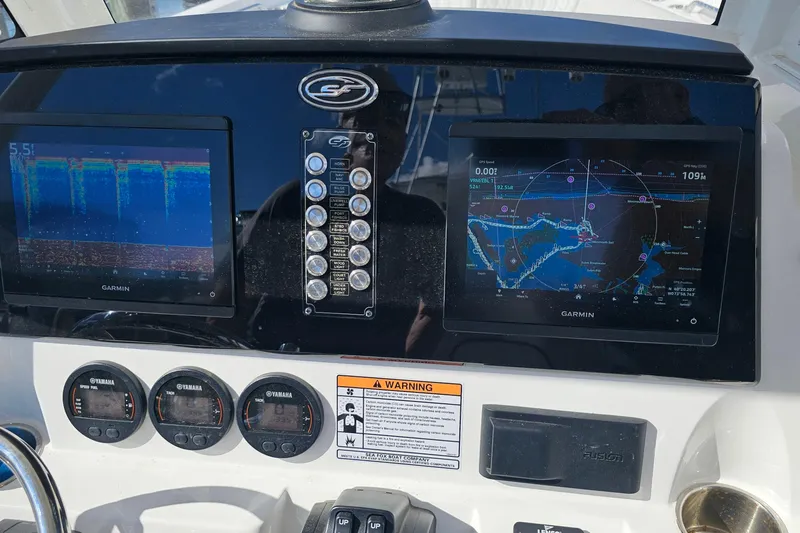  Yacht Photos Pics 2024 Sea Fox 268 Commander dashboard with Garmin navigation displays and Yamaha gauges.