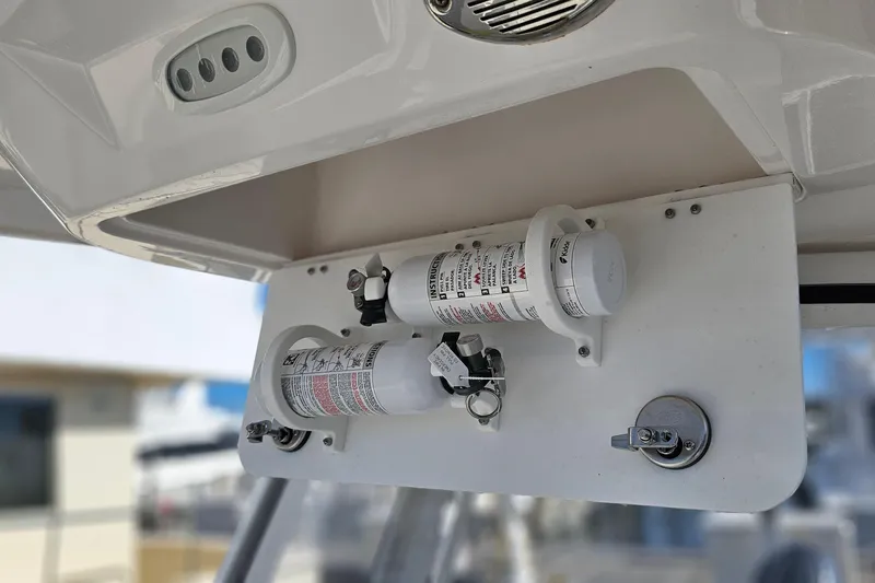  Yacht Photos Pics 2024 Sea Fox 268 Commander fire extinguisher setup under boat console.