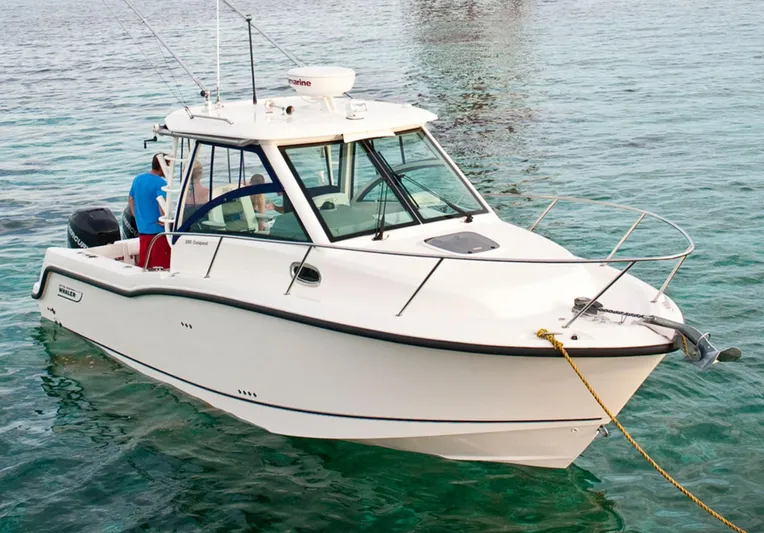  Yacht Photos Pics Manufacturer Provided Image: 2015 Boston Whaler 285 Conquest boat on clear water.