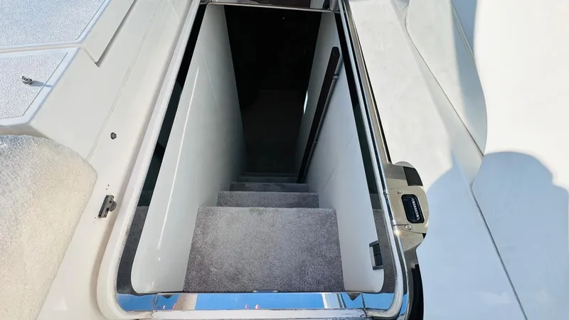  Yacht Photos Pics Staircase leading below deck on 2004 Fairline Squadron 74 yacht.