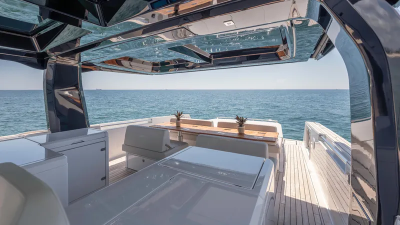 Ladder Yacht Photos Pics Luxurious interior of Fjord 53XL yacht, 2023 model, with ocean view.