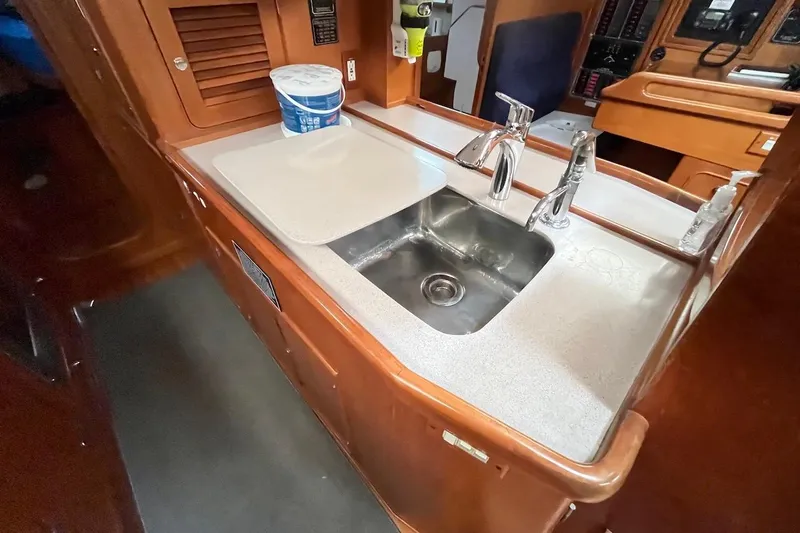  Yacht Photos Pics 2004 Hylas 49 yacht kitchen with sink and countertop.