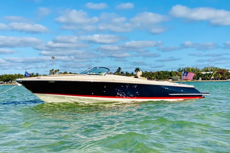  Yacht Photos Pics 2019 Chris-Craft Corsair 30 boat on clear water under a blue sky.