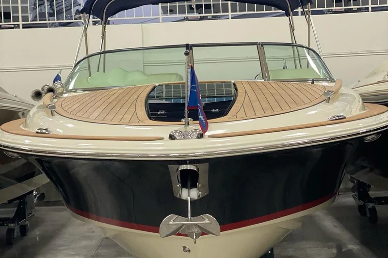  Yacht Photos Pics 2019 Chris-Craft Corsair 30 boat with elegant wood deck and sleek design.