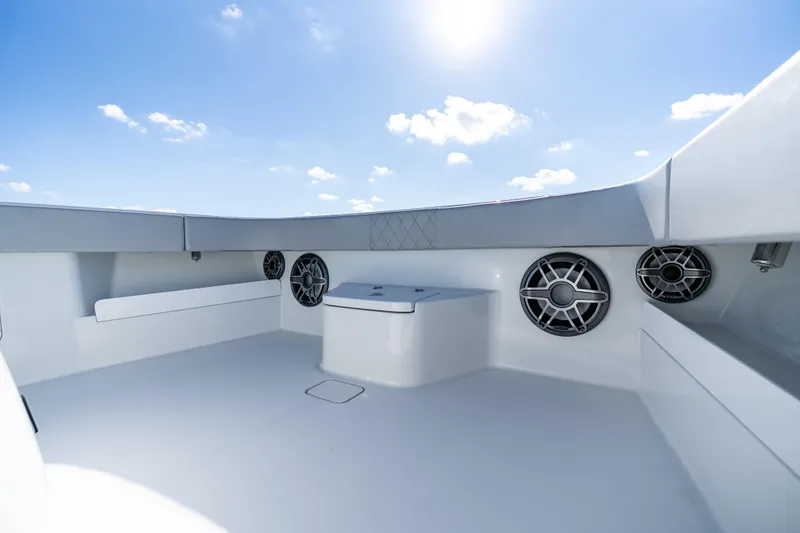 Red White And Booze Yacht Photos Pics Spacious deck of 2022 Freeman 43 boat under clear blue sky.