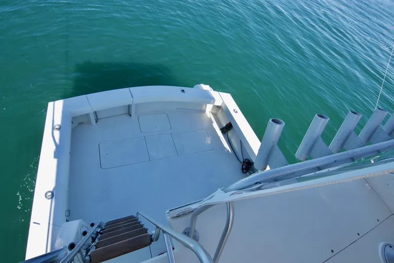 3 Hour Tour Yacht Photos Pics 1989 Viking Convertible boat deck overlooking calm blue water.