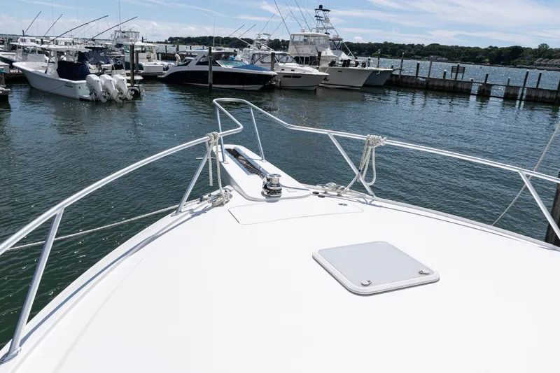  Yacht Photos Pics Bow view of 2014 Viking 42 Express yacht docked at marina.