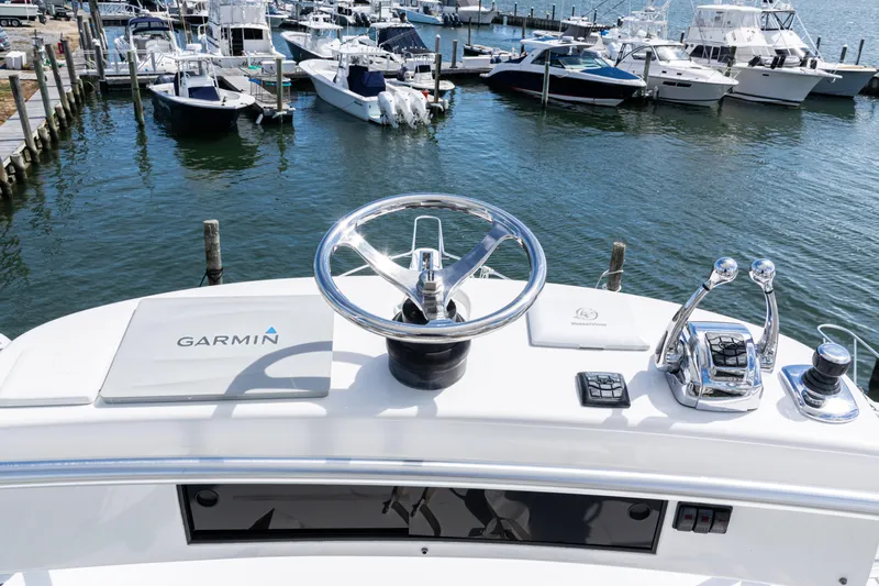  Yacht Photos Pics Helm of 2014 Viking 42 Express yacht with Garmin navigation, docked at marina.