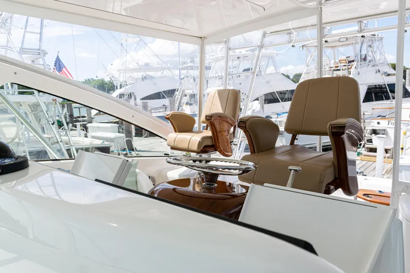  Yacht Photos Pics Interior of 2014 Viking 42 Express yacht with luxurious seating and marina view.