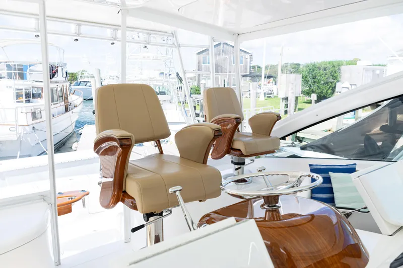  Yacht Photos Pics Luxurious 2014 Viking 42 Express yacht interior with plush seating and elegant design.