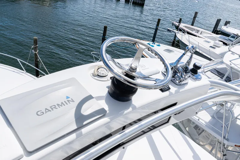  Yacht Photos Pics Steering console of 2014 Viking 42 Express yacht with Garmin navigation system.