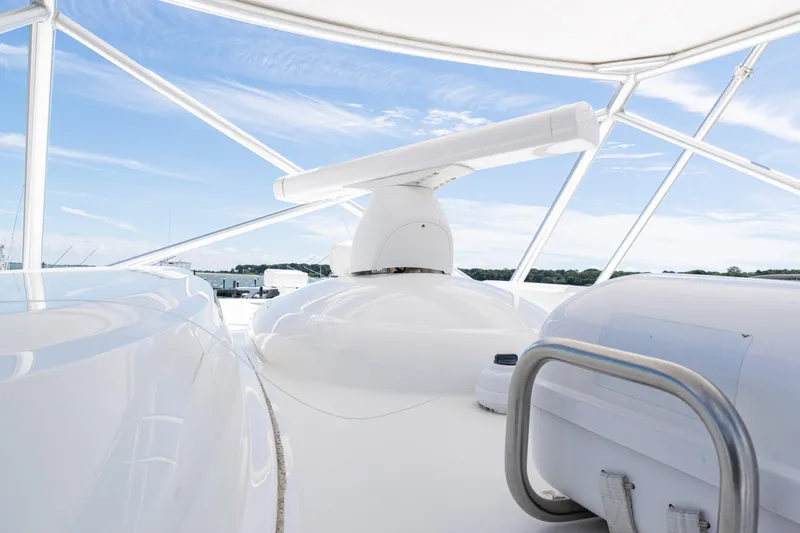  Yacht Photos Pics 2014 Viking 42 Express yacht radar and equipment under clear blue sky.