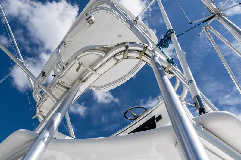  Yacht Photos Pics 2014 Viking 42 Express yacht tower against a bright blue sky.