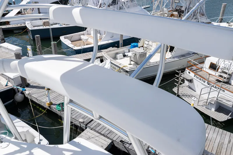  Yacht Photos Pics 2014 Viking 42 Express yacht docked at marina with other boats.