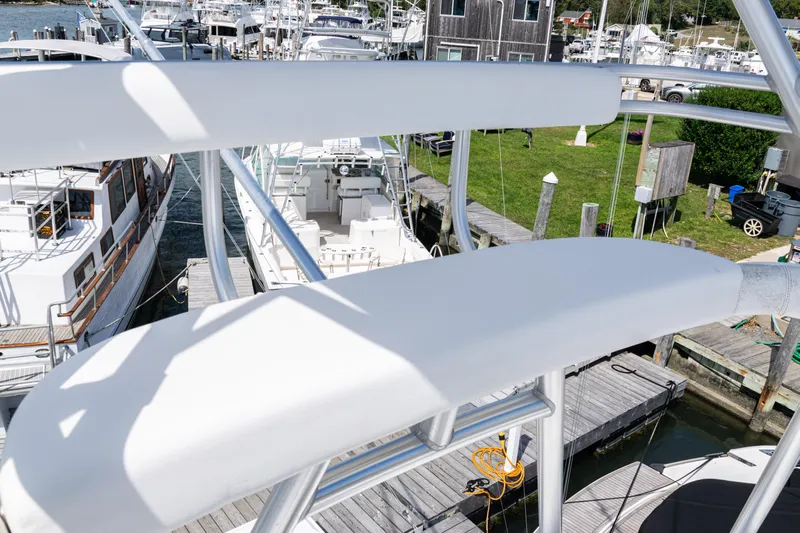  Yacht Photos Pics 2014 Viking 42 Express yacht docked at marina, view from upper deck.