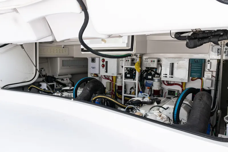  Yacht Photos Pics Engine room of 2014 Viking 42 Express yacht, showcasing complex machinery and wiring.