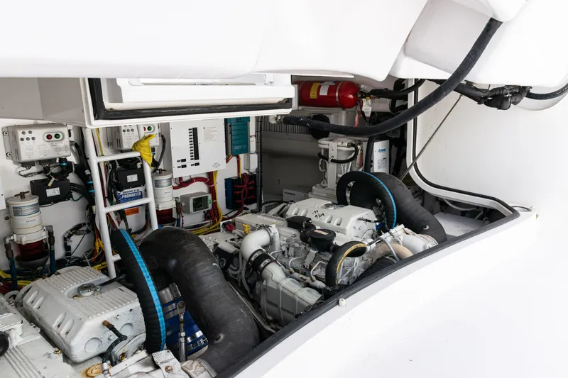  Yacht Photos Pics Engine room of 2014 Viking 42 Express yacht, showcasing mechanical components and systems.