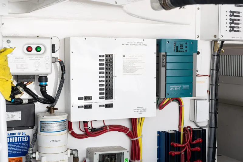  Yacht Photos Pics Electrical panel and components in a 2014 Viking 42 Express yacht engine room.