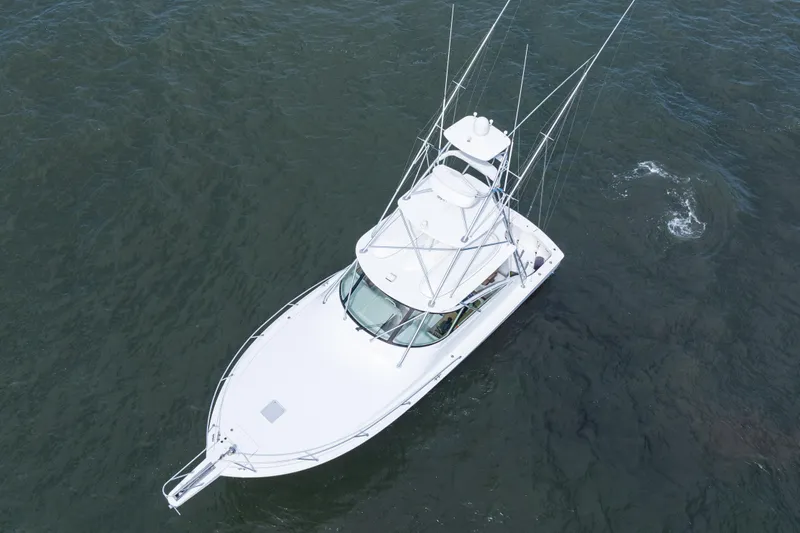  Yacht Photos Pics Aerial view of 2014 Viking 42 Express boat on open water.