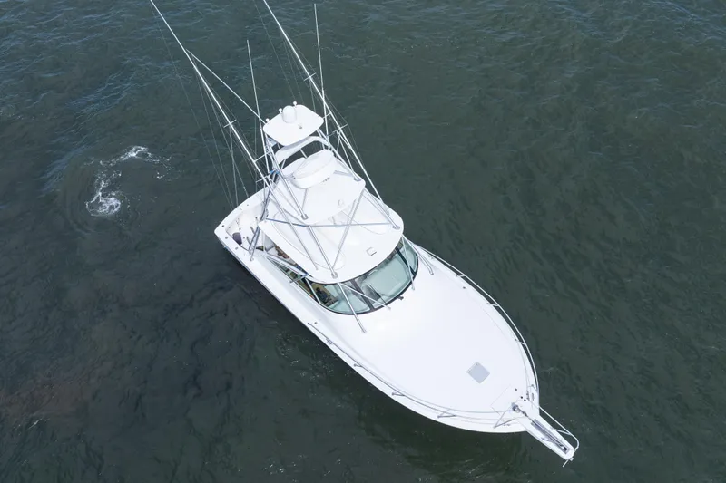  Yacht Photos Pics Aerial view of 2014 Viking 42 Express yacht on open water.